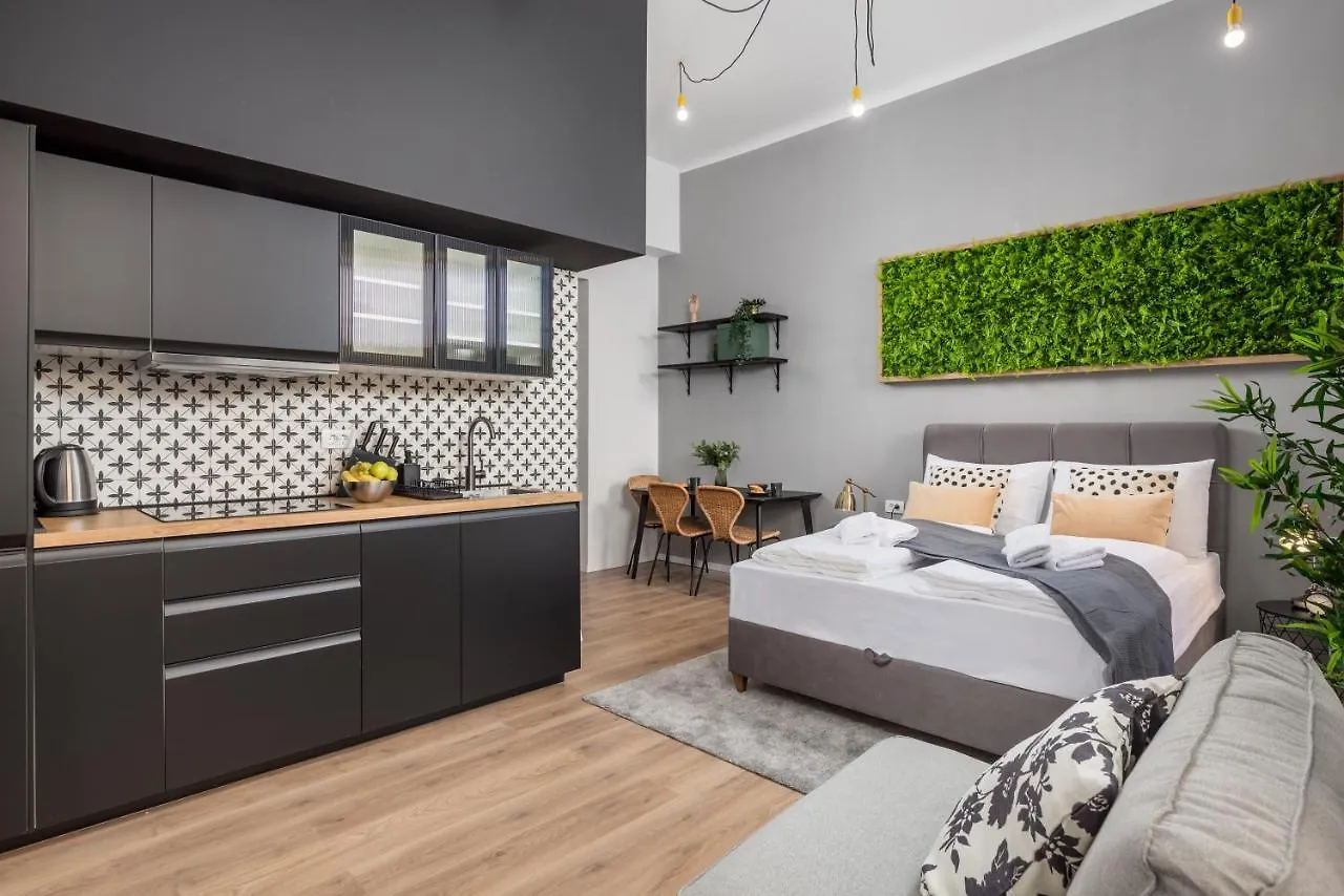 Apartments & Rooms One World